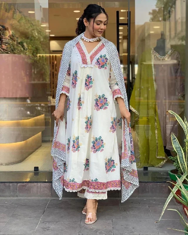 Flaunt the amazing white color of this suit in your upcoming festivities. ?The divine and luxurious cotton fabric with digital Print gives it elegant look.